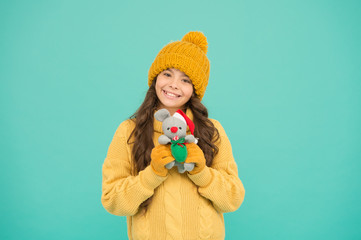 Chinese horoscope concept. Rat symbol year. Plush toy. 2020 rat year. It has characteristics of animal with spirit wit alertness delicacy flexibility and vitality. Girl child hold rat or mouse toy