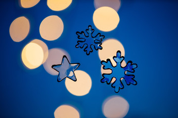 Transparent christmas decorations against blurred lights