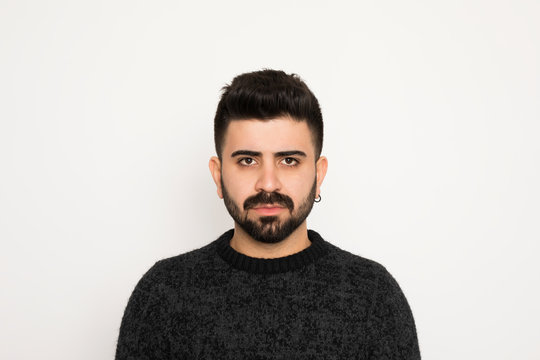 Young Man Portrait Lookling At Camera. Isolated On White Background.