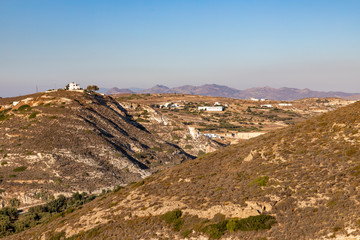 Small mountains, valley and typical  vegetation in Milos