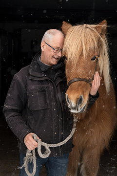 Senior man with pony