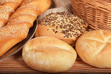 various fresh crispy baked buns with seeds
