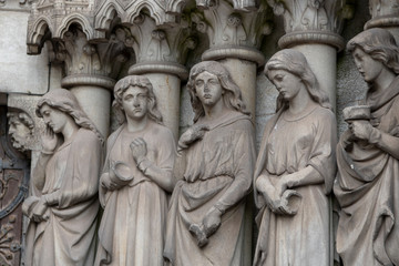 Fototapeta na wymiar The Foolish Virgins from Parable of the Ten Virgins, Saint Fin Barre's Cathedral, Cork, Republic of Ireland
