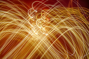 Naklejka premium Long exposure abstract light painting sparks