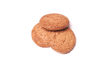 Three homemade oatmeal cookies isolated on white background
