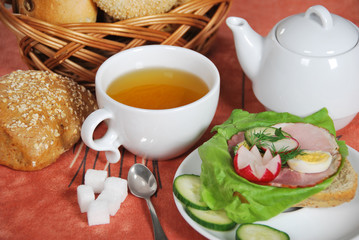 healthy breakfast sandwich with ham and vegetables and sweet tea