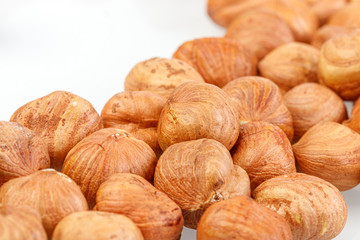 macro hazelnuts nuts on a white background