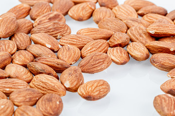 macro almond nuts on a white background