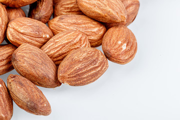 macro almond nuts on a white background