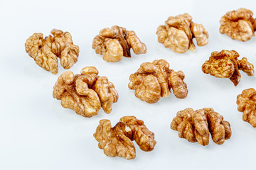 macro juglandaceae nuts, walnut on a white background
