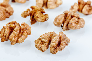 macro juglandaceae nuts, walnut on a white background