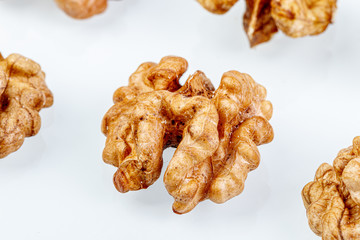 macro juglandaceae nuts, walnut on a white background