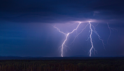 Fototapeta na wymiar lightning storm at night