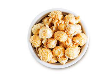 Caramel popcorn on a white isolated background