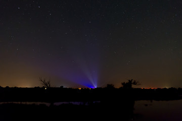 Starry Sky with city lights at Starry Park Westhavelland, Havelaue, Brandenburg, Germany