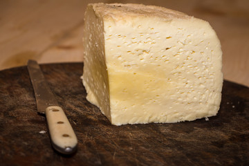 cheese on wooden board
