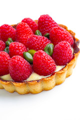 cake with raspberries isolated on white	