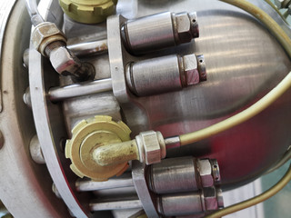 Pipes of aircraft engine. Abstract close-up photo with curved steel tubes as abstract industrial...