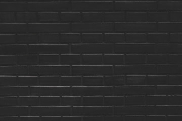 Dark black beautiful new toned brick wall texture background. Close up, copy space	