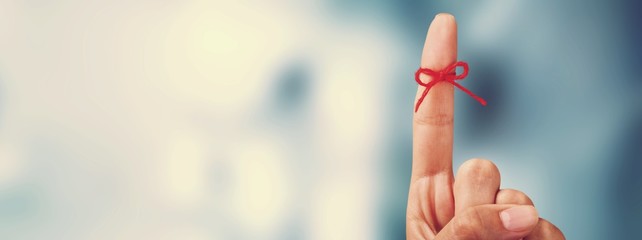 Index finger tied with rope, Reminder concept