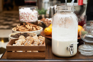 Christmas festive table with dessert cookies in shape of gingerbread man
