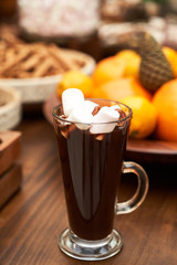 Christmas festive table with christmas cocktail glass, close-up