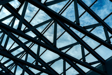 the abstract modern large window design inside building against the sky