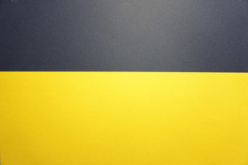 Color yellow and blue papers background with glitter