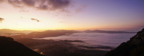 Mystic morning dawn over a foggy valley © Alessio Russo