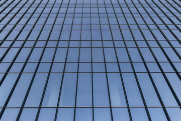 endless glass and steel wall of skyscraper, modern building architecture of business center, abstract curved lines