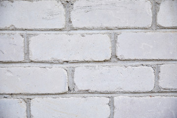 brick wall with gray rough surface