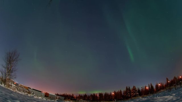 Aurora borealis in the night northern sky. Ionization of air particles in the upper atmosphere.