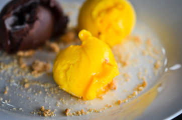 tasty home made mango & chocolate ice cream with biscuits