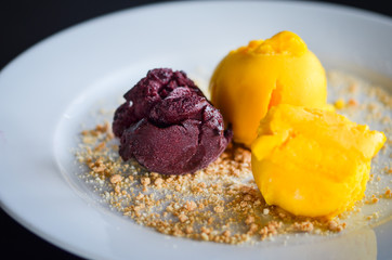 tasty home made mango & chocolate ice cream with biscuits
