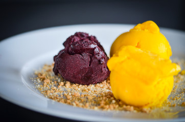 tasty home made mango & chocolate ice cream with biscuits