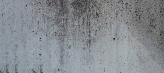 cement wall with dirt spots for background use.