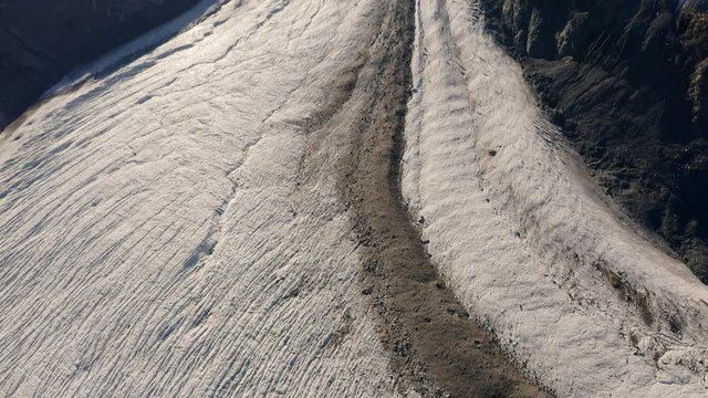 Pan upwards on Gornerglacier near Zermatt in switzerland, full glacier in view