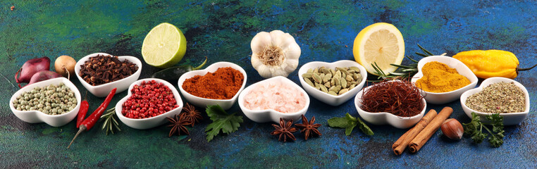 Spices and herbs on table. Food and cuisine ingredients with oil and vinegar