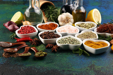 Spices and herbs on table. Food and cuisine ingredients with oil and vinegar
