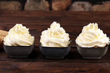 Vanilla soft served ice cream tasty sundae dairy ice cream on rustic background