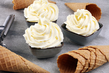 Vanilla soft served ice cream tasty sundae dairy ice cream on rustic background