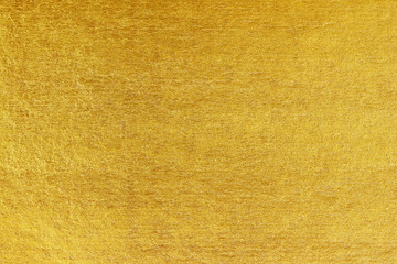 Shiny yellow leaf gold foil texture background