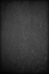 Dark grey black slate background or texture.