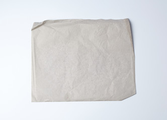 empty gray crumpled sheet of paper, full frame