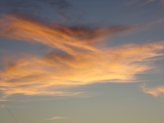 Orange clouds with a blue sky