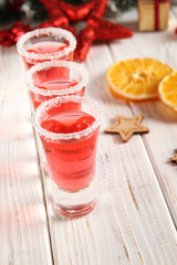 Christmas drink red in glass glasses.