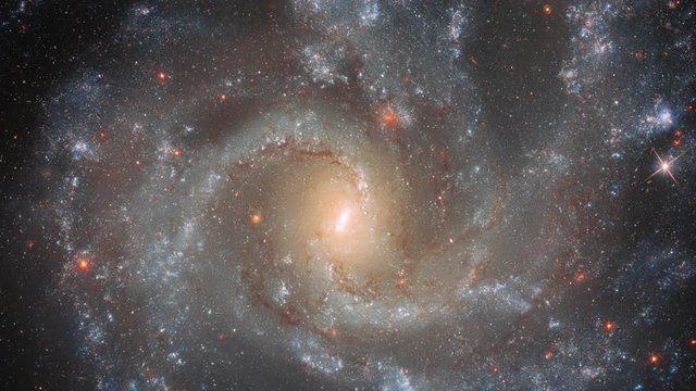 Rotating galaxy in outer space, space travel fantasy exploration with thousand stars moving around. Contains public domain image by Nasa