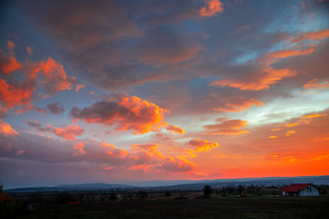 Fantastic clouds on the sky at the sunset