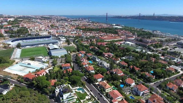 Lisbon cityscape river tagus belem Portugal aerial shot 4k