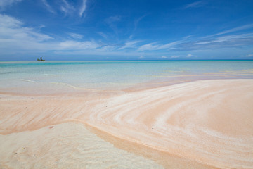 Fototapeta na wymiar pink sand beach and sea